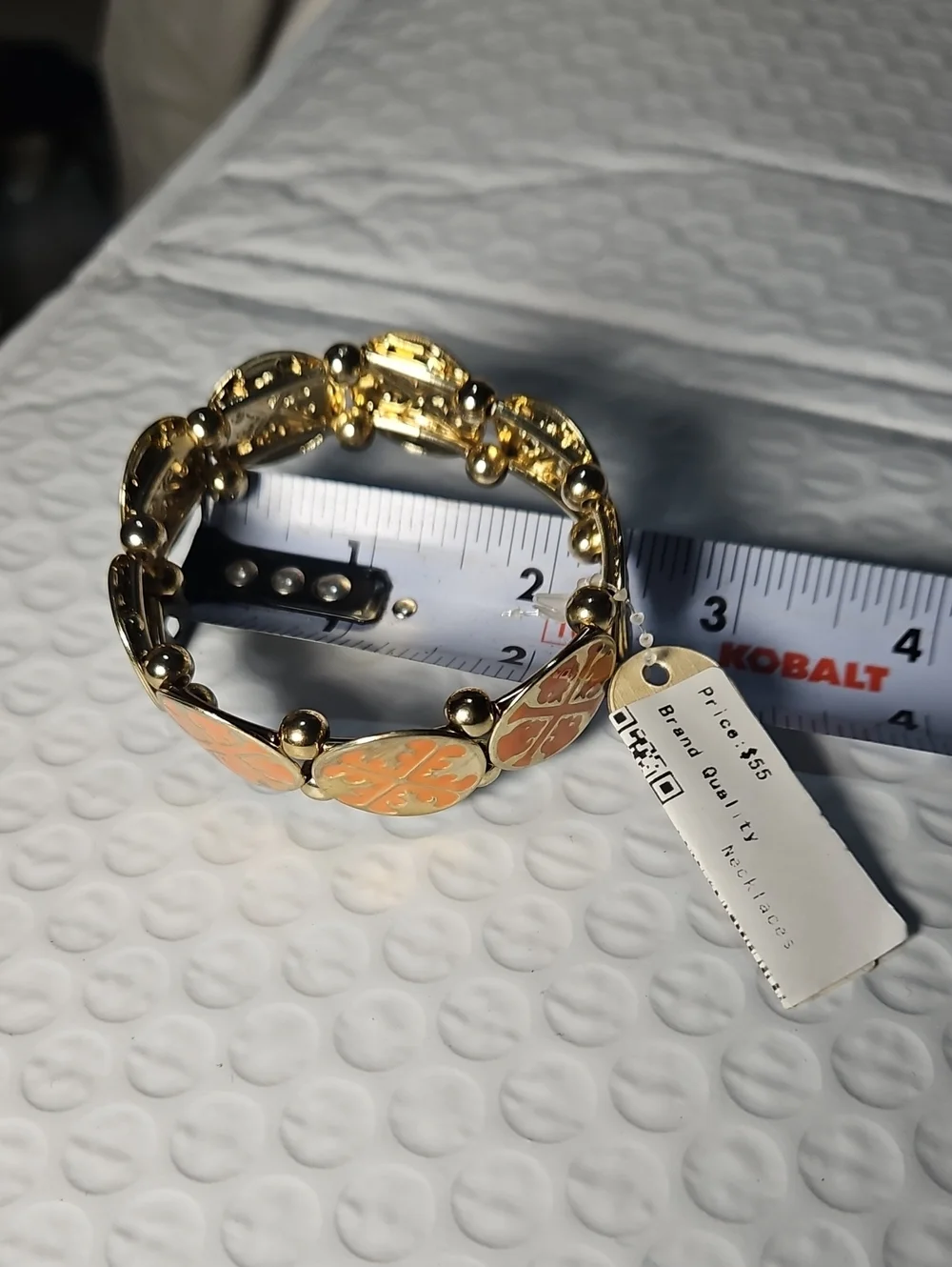 Tory Burch Gold-Tone Bracelet with Coral Orange Enamel Clover Motifs